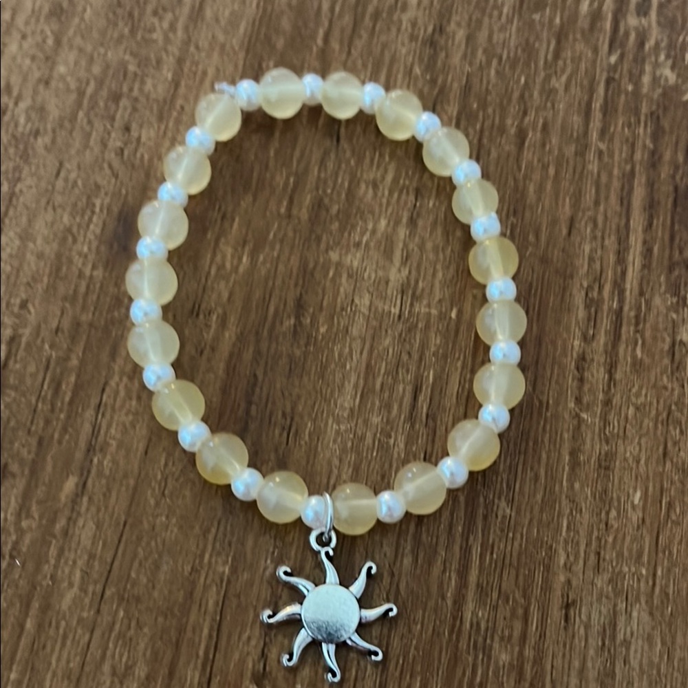 Yellow Beaded Bracelet with Sun Charm